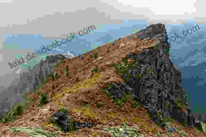 Tommy Howard's Photograph Of A Majestic Mountain Range In Ireland Shrouded In Mist, With A Rainbow Arching Across The Sky Picturesque Scenery In Ireland Tommy Howard